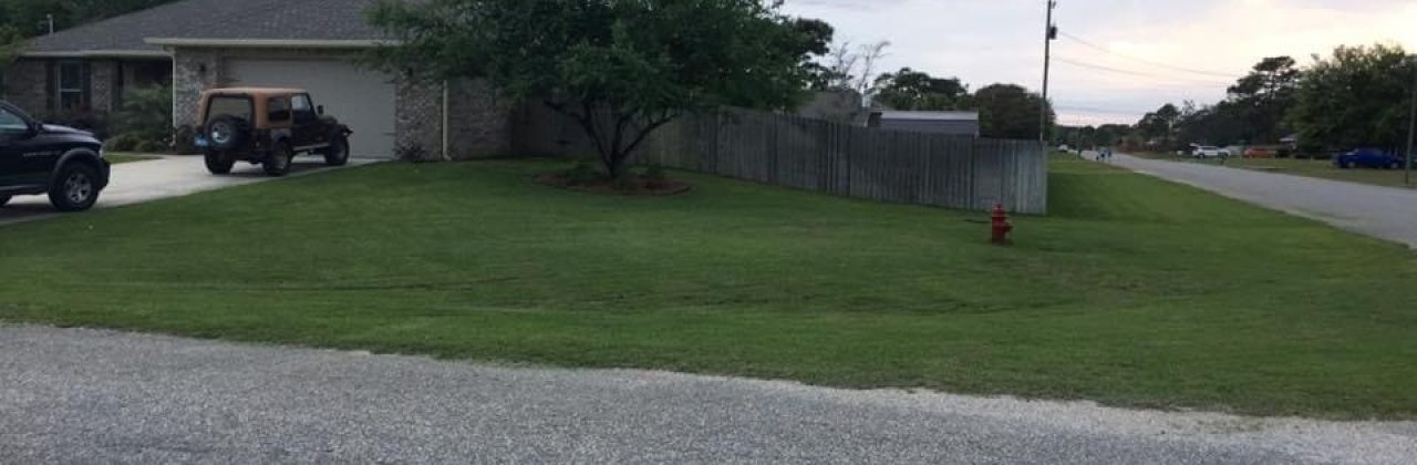 Slade Lawn Care - Landscaper in Navarre